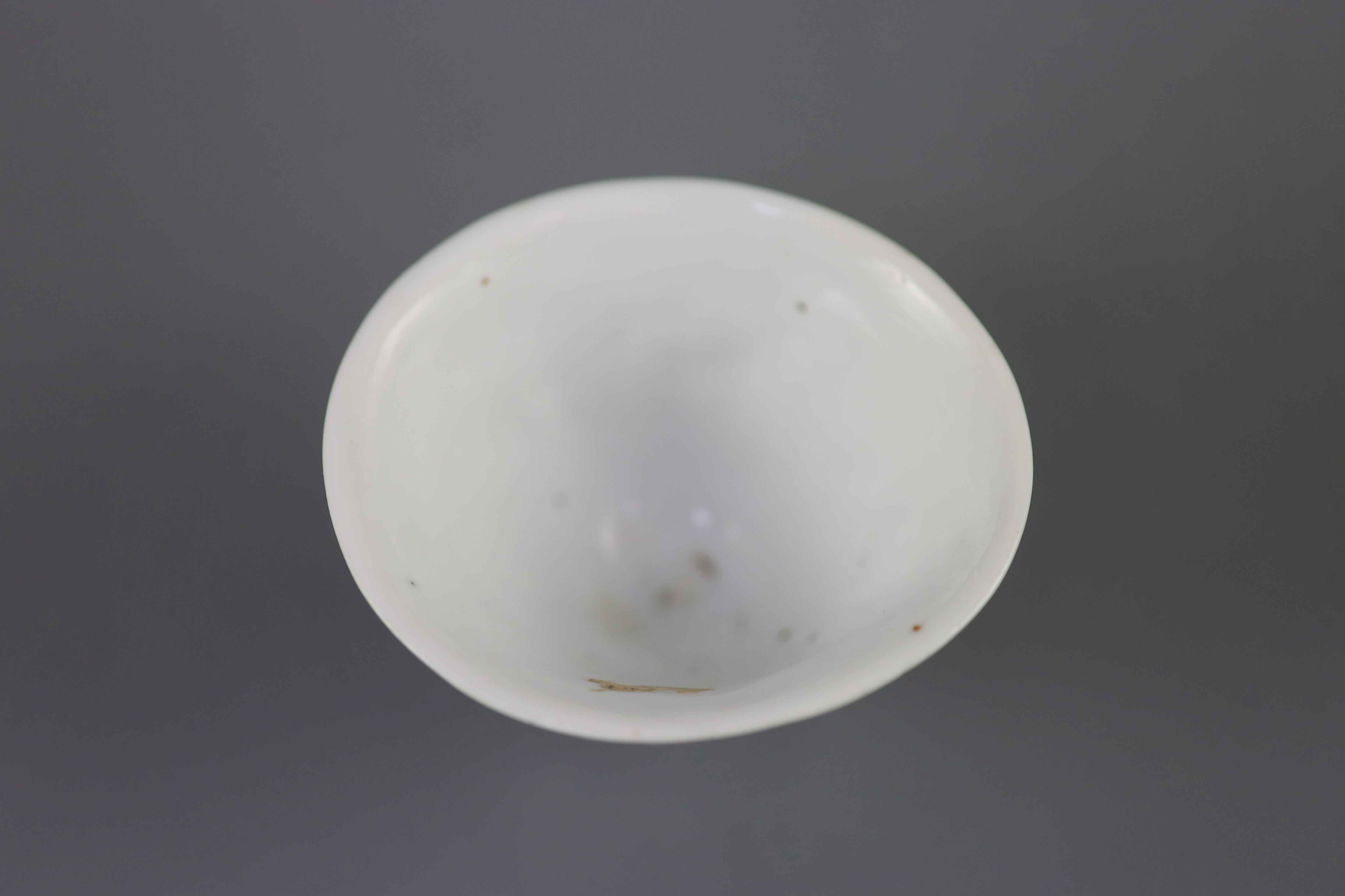 A Chinese Dehua blanc de chine libation cup, 5.3cm high